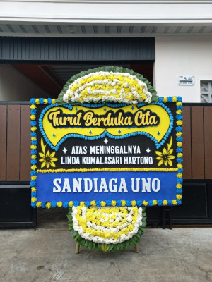 Papan Bunga Duka di Topo