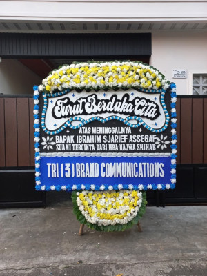 Papan Bunga Duka di Topo